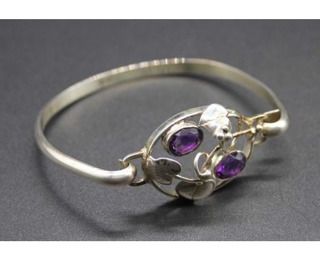 A contemporary Arts &amp; Crafts silver and amethyst set bangle, sponsor HW, 17.4g, 6cm