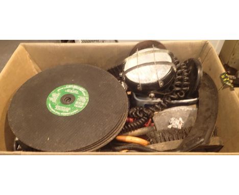 A box containing various tools and accessories to include large cutting discs, axe, plug in light etc. Not available for in-h