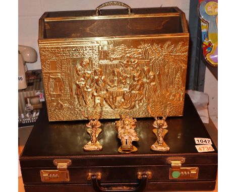 A brass single handled magazine rack, three vintage brass door knockers and a leather effect briefcase. Not available for in-
