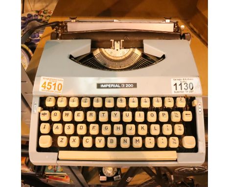 Imperial 200 typewriter in blue. Not available for in-house P&amp;P, contact Paul O'Hea at Mailboxes on 01925 659133 