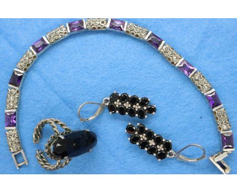 925 silver marcasite and amethyst bracelet, L: 20 cm, pair of 925 silver earrings and a presumed sterling silver stone set ri