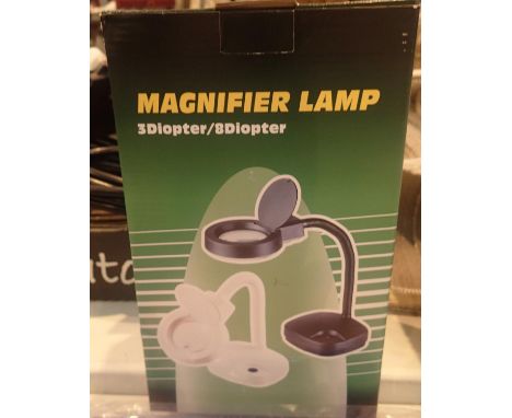New and boxed magnifier lamp. P&amp;P Group 2 (£18+VAT for the first lot and £3+VAT for subsequent lots) 