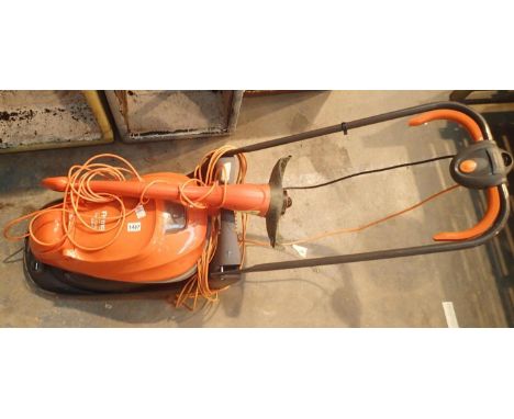 Electric Flymo Easy Glide 300v lawn mower and a Flymo mini trim strimmer. Not available for in-house P&P, contact Paul O'Hea 