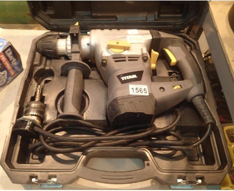 Titan magnesium boxed hammer drill. Not available for in-house P&P, contact Paul O'Hea at Mailboxes on 01925 659133Condition 