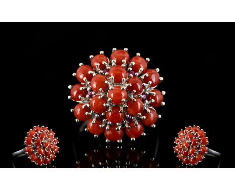 Natural Coral Cluster Ring, with ruby accents; circles of round cut cabochons of natural coral from the Mediterranean, totall