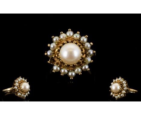 Ladies 9ct Gold Pearl Set Cluster Ring In a Flower head Design. The Central Set Pearl Surrounded by 15 Smaller Pearls ( 1 Pea