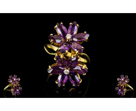 18ct Gold - Double Flower head Designed Amethyst and Diamond Dress Ring From The 1970's Period. Unusual Design. Marked 18ct -