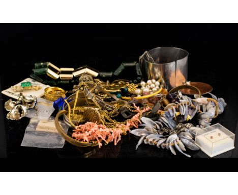 A Collection Of Costume Jewellery A varied lot, comprising various 1960's/70's stone set cuffs, Aztec style statement pendant