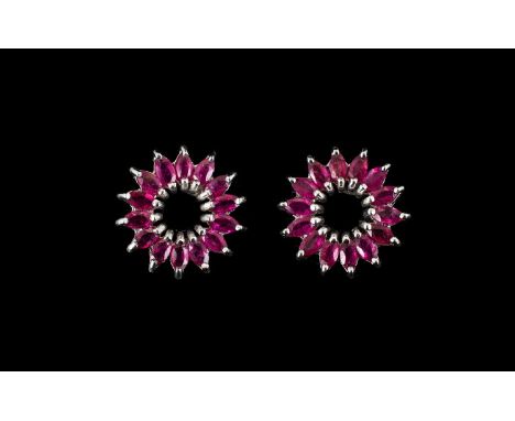 Ruby Marquise Cut Circle Earrings, a flared circle of marquise cut rubies spreading from an open centre, totalling 2.8cts; a 