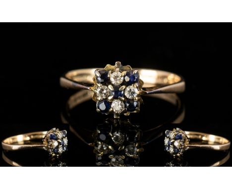 Ladies 9ct Gold Diamond and Sapphire Cluster Ring 'Flowerhead setting. The diamond of good colour and clarity. Pleasing ring 