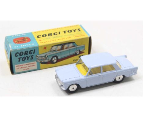 Corgi Toys, 217 Fiat 1800 light blue, lemon interior, smooth hubs, in the original blue and yellow card box (NM-BNM)