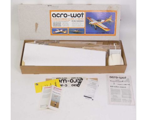 A Chris Foss Designs radio-controlled and petrol-driven wooden and plastic aircraft kit group of two to include; a WOT 4 Mk3 