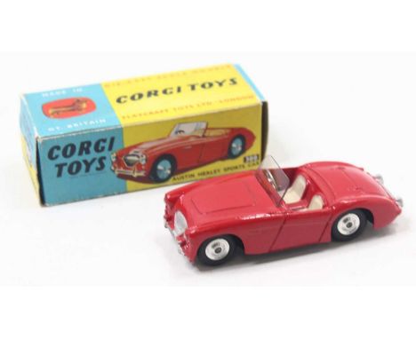 Corgi Toys, 300 Austin Healey sports car, red body with cream seats, shaped spun hubs, in the original blue and yellow all-ca