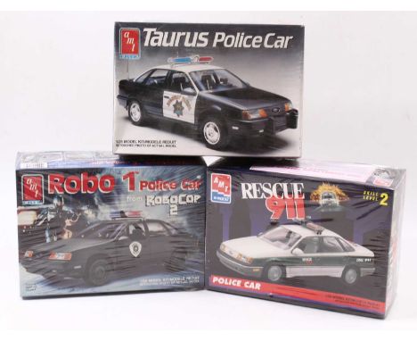 AMT/ERTL 1.25 scale Movie/TV/911 kits, 6059 ‘Robo 1’ Ford Taurus ‘Police’from ‘Robocop 2’ @1990, 2 in 1, 6075 1990 Ford Tauru
