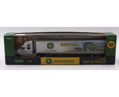 Britains/Ertl 1/64 scale Diecast metal of a No.15564 John Deere Semi W/Trailer housed in a plastic display pictorial card box