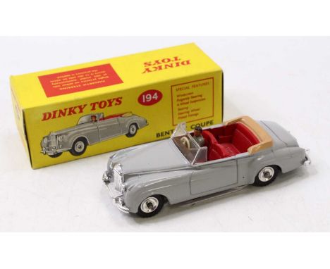 Dinky Toys No. 194 Bentley Coupe comprising of grey body, bright red interior, with a brown tonneau, and driver figure, compl