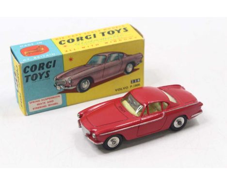 Corgi Toys, 228 Volvo P.1800 with lighter red body, yellow interior and spun hubs, jewelled headlights, in the original blue 