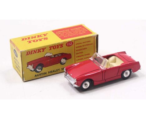 Dinky Toys No. 112 Austin Healy Sprite comprising red body, cream interior and spun hubs, in the original picture sided card 