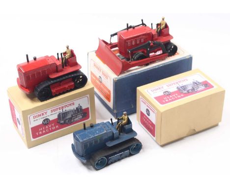 Dinky Toys group of 3 to include; Nos. 563 Heavy Tractor (x2) both housed in repro boxes together with a No.561 Blaw Knox Doz