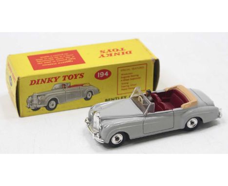 Dinky Toys No. 194 Bentley Coupe comprising of grey body, maroon interior, with a brown tonneau, and driver figure, complete 