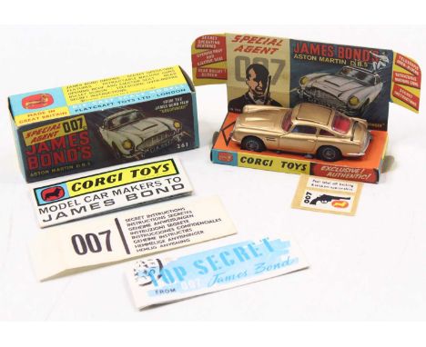 Corgi Toys No. 261 James Bond's Aston Martin DB5, metallic gold body, with wire wheels, all mechanisms in working order, come