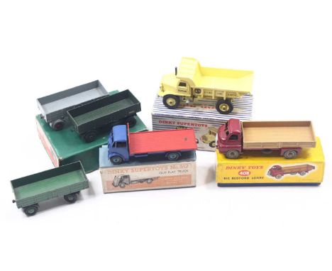 Dinky Toys group of 4 to include; No.965 Euclid Rear Dump Truck, 512 Guy Flat Truck in dark blue body with red back, No.408 B