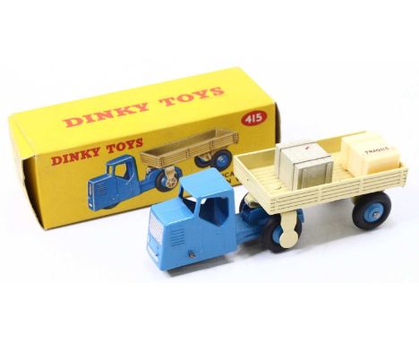 Dinky Toys No. 415 mechanical horse and open wagon, comprising of blue tractor unit and cream trailer both fitted with light 