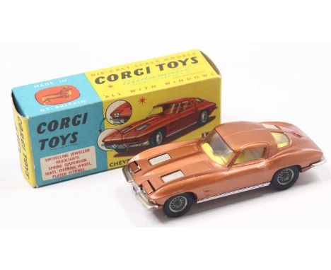 Corgi Toys 310 Chevrolet Corvette Stingray in metallic bronze body, yellow interior, chrome trim with wire wheels, in the ori