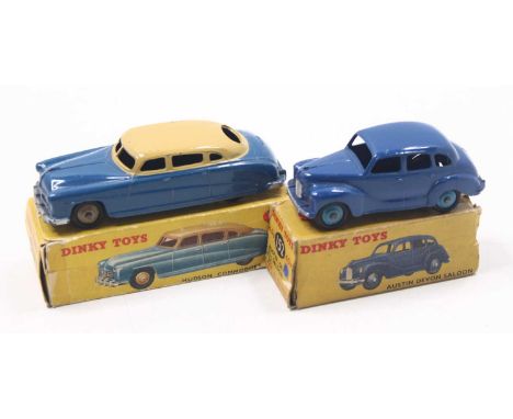 Dinky Toys group of 2 to include; No.152 Austin Devon Saloon in dark blue body with mid blue hubs, in a correct colour spot b