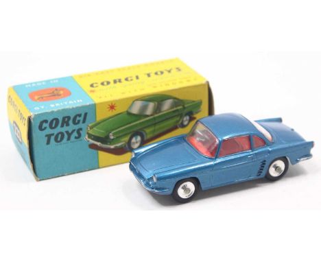A Corgi Toys No. 222 Renault Floride in metallic blue with red interior and silver hubs, housed in the original all-card imag
