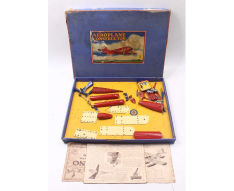 Meccano Aeroplane Constructor Outfit No.2 in red consisting of the fuselage with separate roundels , 2 sets of wings,2 floate