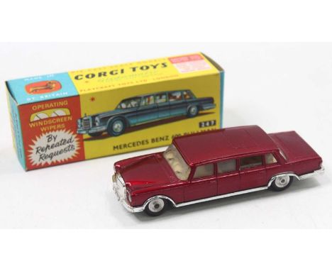 Corgi Toys No. 247 Mercedes Benz 600 Pullman comprising of metallic red body with cream interior and spun hubs housed in the 