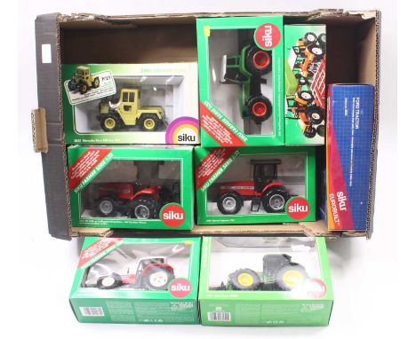 Eight various boxed Siku 1/32 scale model tractors to include No. 2962 Steyr 9145 tractor, a No. 2960 Massey Ferguson 9240 tr