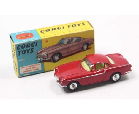 Corgi Toys, 228 Volvo P.1800 with red body, yellow interior and spun hubs, jewelled headlights, in the original blue and yell