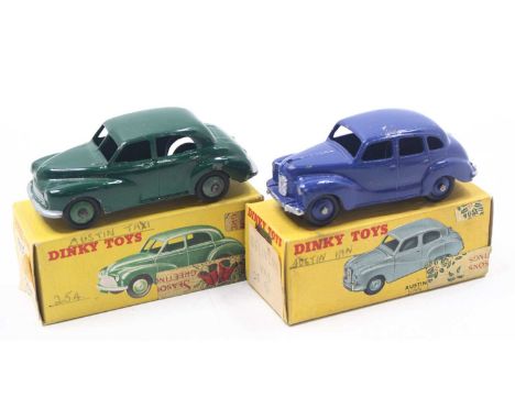 Dinky Toys group of 2 to include; No. 159 Morris Oxford Saloon in a dark green body with Mid green ridged hubs, and a No.254 
