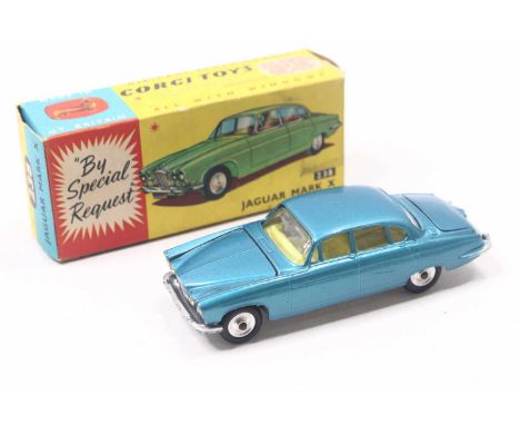 Corgi Toys No. 238 Jaguar Mk 10, comprising of metallic deep blue body with lemon interior and spun hubs, with two luggage pi