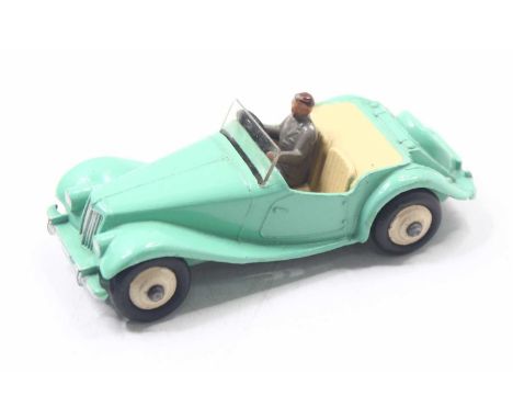 Dinky Toys No. 102 MG Midget sports car comprising light green body with cream interior and cream hubs and driver figure, loo
