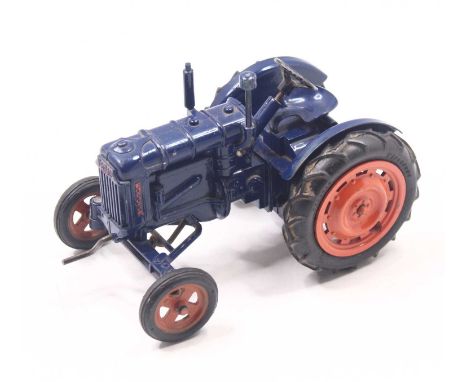 A Chad Valley diecast and clockwork Fordson Tractor, dark blue body with orange hubs, with some playwear, no box. Good condit