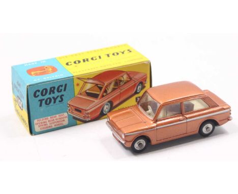Corgi Toys No. 251 Hillman Imp comprising metallic bronze body complete with off-white interior and spun hubs, housed in the 