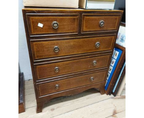 A 61cm Edwardian mahogany, cross banded and strung chest of two short and three long drawers, set on bracket feet