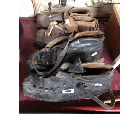 A pair of vintage black leather snow/ski boots - sold with a similar brown pair