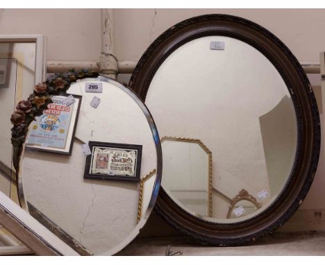 A vintage Barbola dressing table mirror with bevelled oval plate and easel back - sold with an old wood grained framed bevell