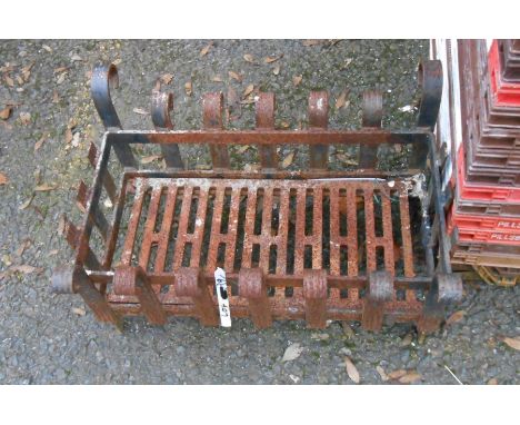 A small cast iron fire grate