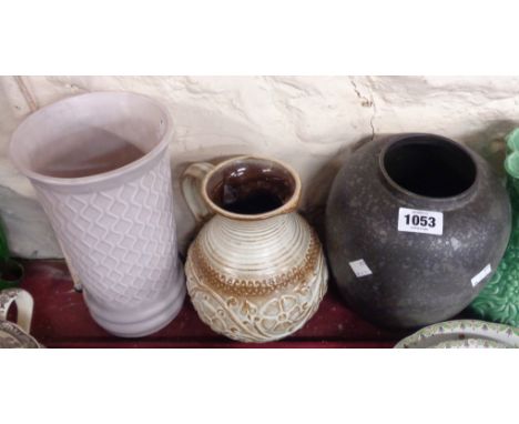 A West German pottery vase of handled jug form, a SylvaC pottery vase and a Poole Pottery vase with lustre splash decoration