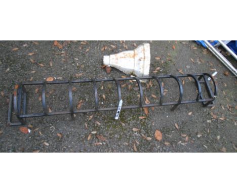 A cast iron drain hopper - sold with a wrought iron planter