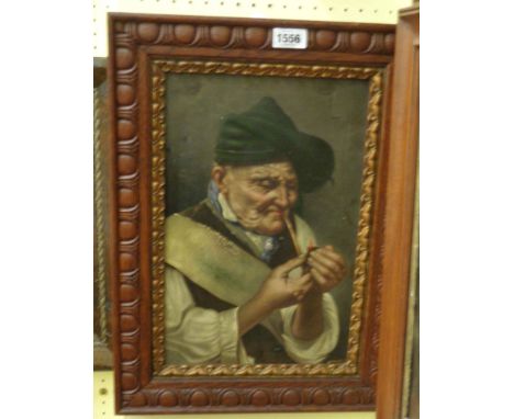 An old carved oak framed continental oil on canvas, depicting an elderly Tirolean gentleman lighting a pipe