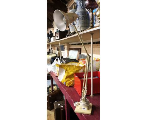 A vintage Herbert Terry &amp; Sons anglepoise lamp with single stepped base and original cream painted finish