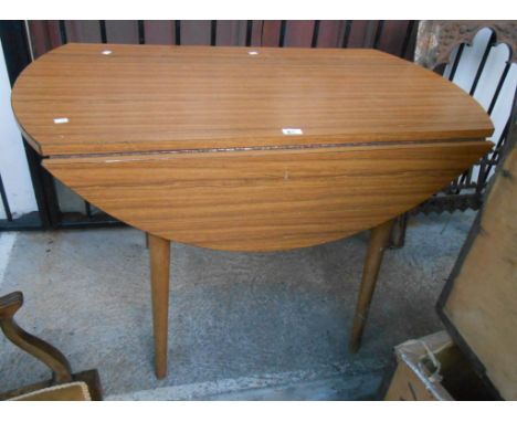 A 1.1m vintage drop-leaf dining table with woodgrain Formica finish
