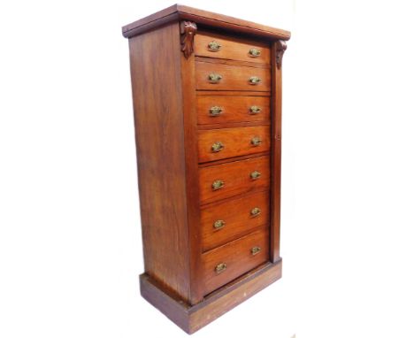 A 61cm late Victorian mahogany Wellington chest with flight of seven bracket locking graduated drawers, set on plinth base