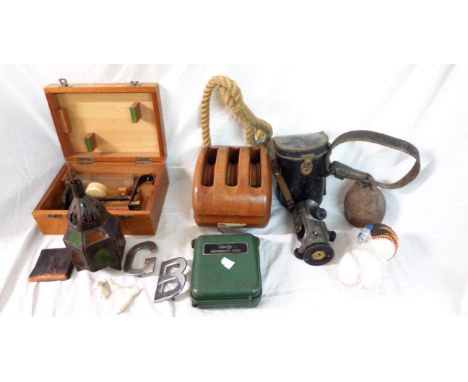 A box containing a quantity of collectable items including levels, chrome classic car GB letters, etc.